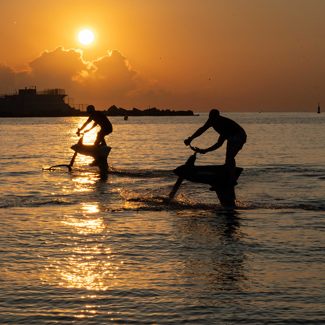 Efoil Bike Lessons on Manta5 - Charleston, SC - SL3 Pro - Two People Riding Sunset